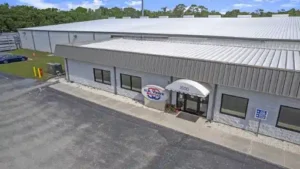 Completed commercial metal roof on a Florida warehouse, an example of roofing done right without cutting corners