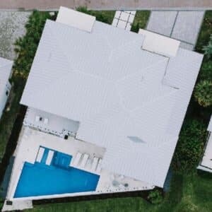 Overhead view of a reflective metal roof which offers heat-reflective and energy-saving benefits.