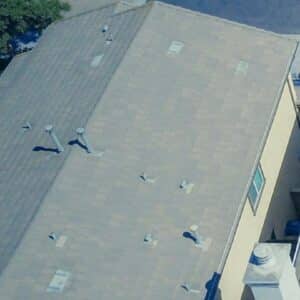 Aerial view of a white reflective roof, a popular energy-efficient roofing option in Florida.