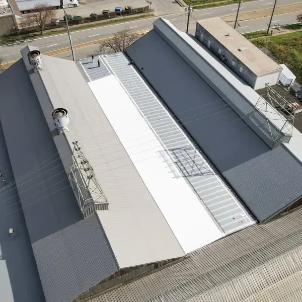 Roof Warranty Work by Troyer Commercial Roofing. Image of restored commercial roof.