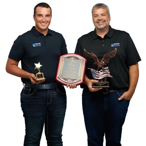 Lester and Tony Profile Photo holding awards for roofing