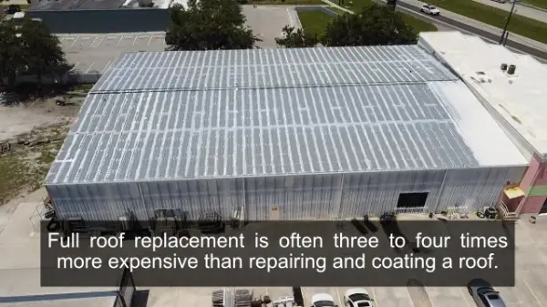 Aerial view of an aging metal commercial roof that’s had a coating partially applied. This text is featured on the image: Full roof replacement is often three to four times more expensive than repairing and coating a roof.