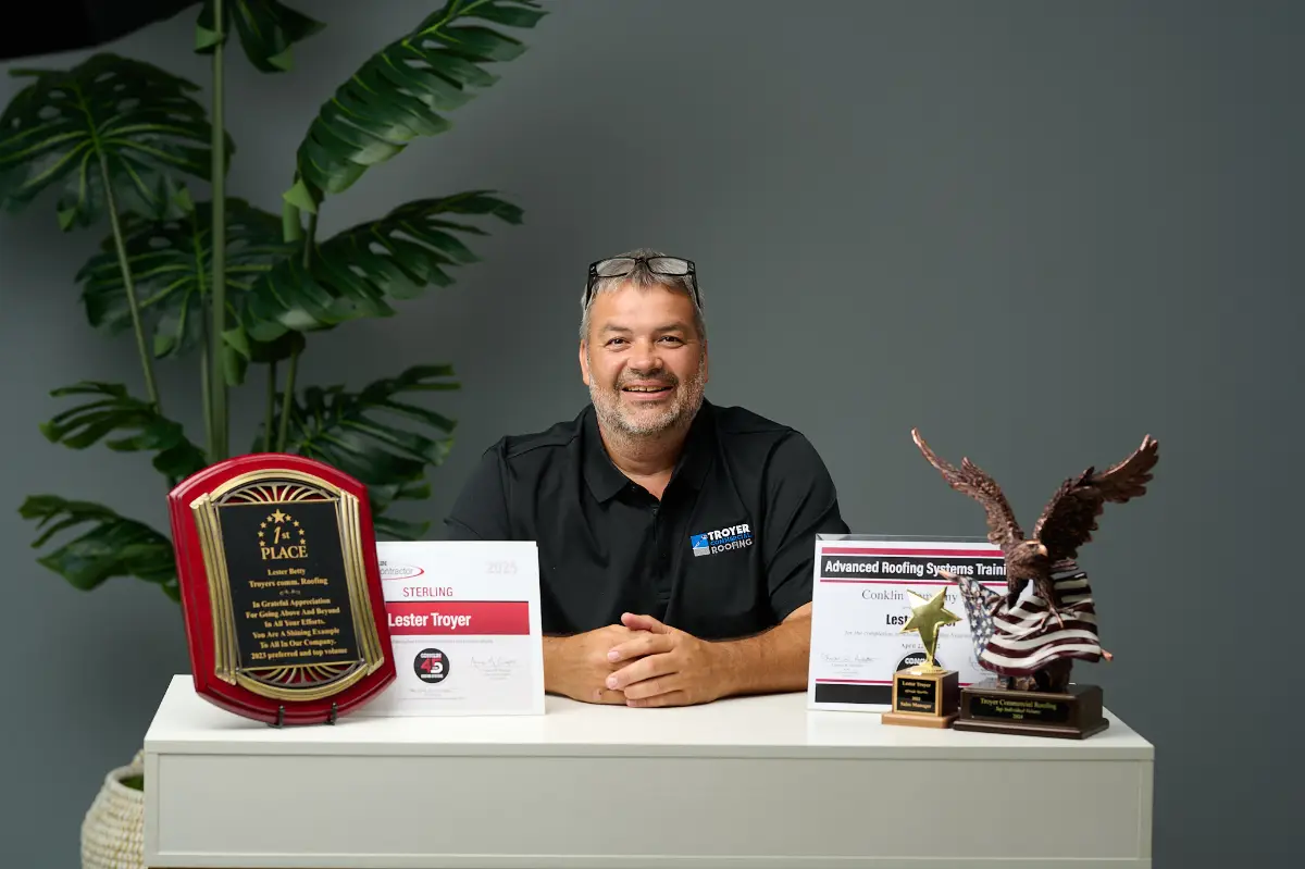 troyer-commercial-roofing-licensed-contractor-awards Licensed roofing contractors from Troyer Commercial Roofing holding awards that highlight their proven credibility and professional recognition.